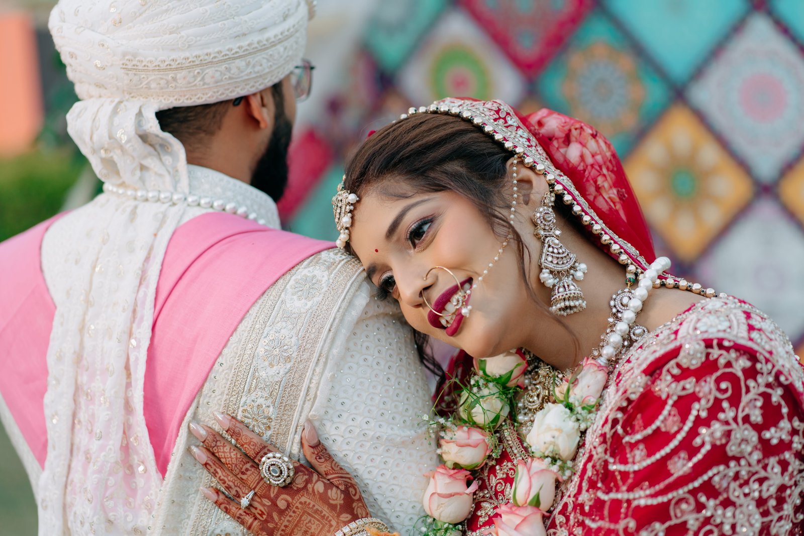 Bride laughing beside her groom during a wedding portrait session
